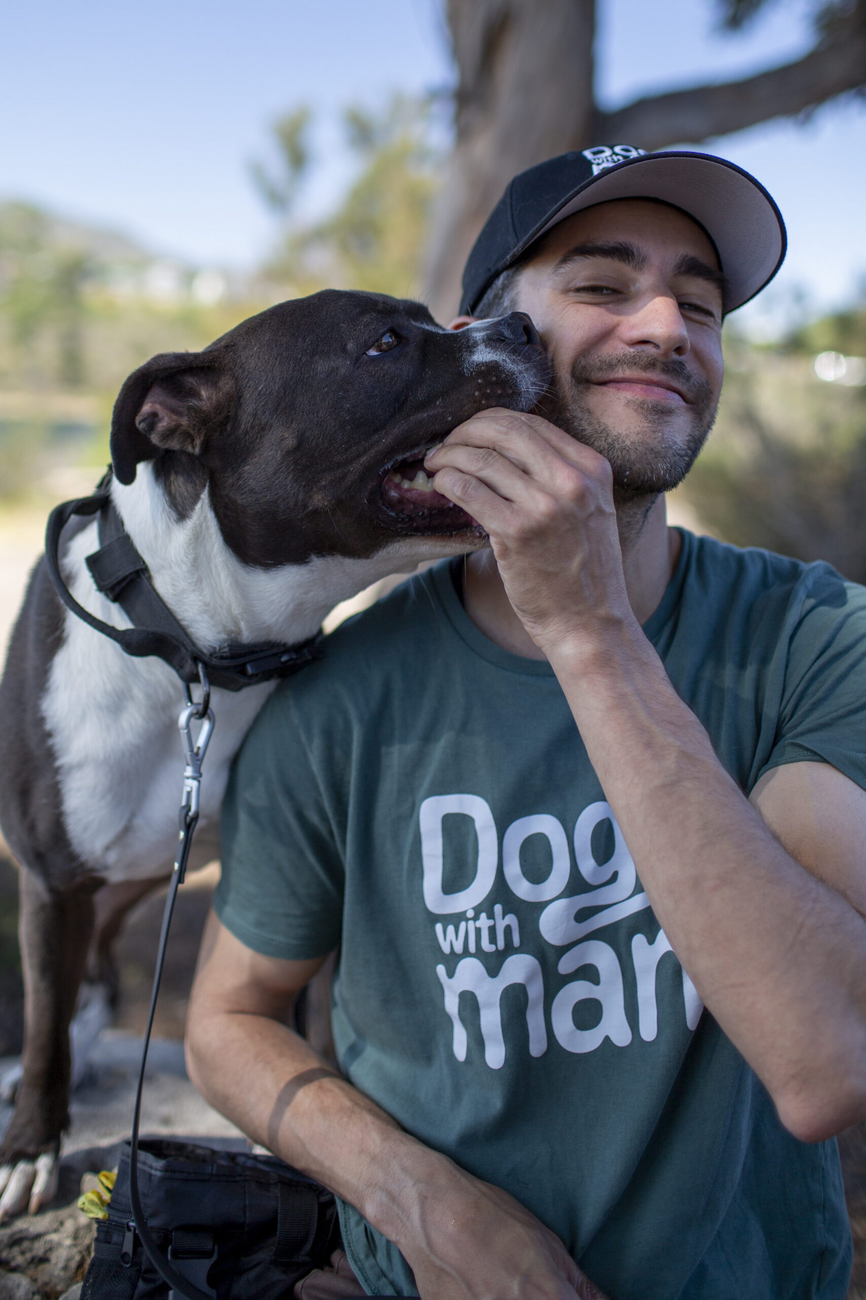 Joe Casanova, Dogs with Man dog trainer, with a dog outdoors